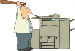 Image of Man Beating a Copy Machine
